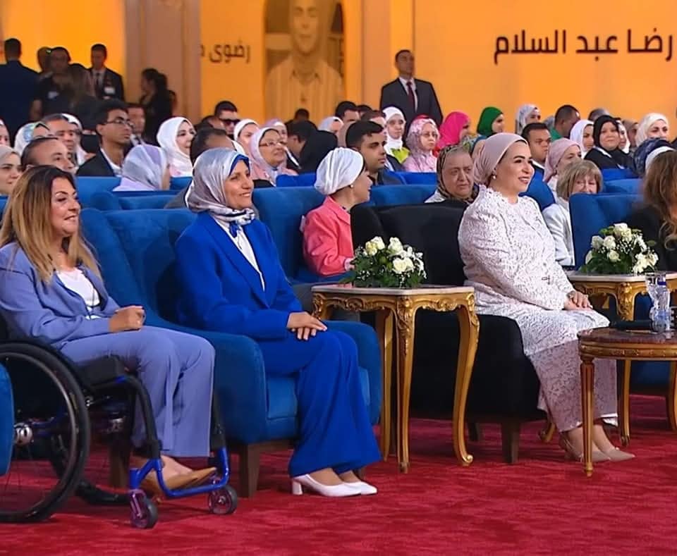 May be an image of ‎3 people, dais and ‎text that says "‎رصوى رضا عبد السلام বि‎"‎‎